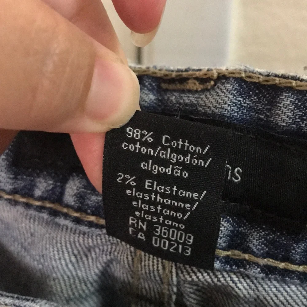 Calvin Klein distressed medium dark wash jeans 10